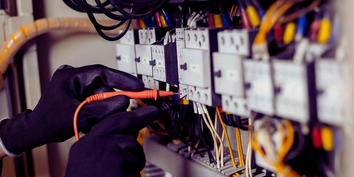 man working on a distribution board